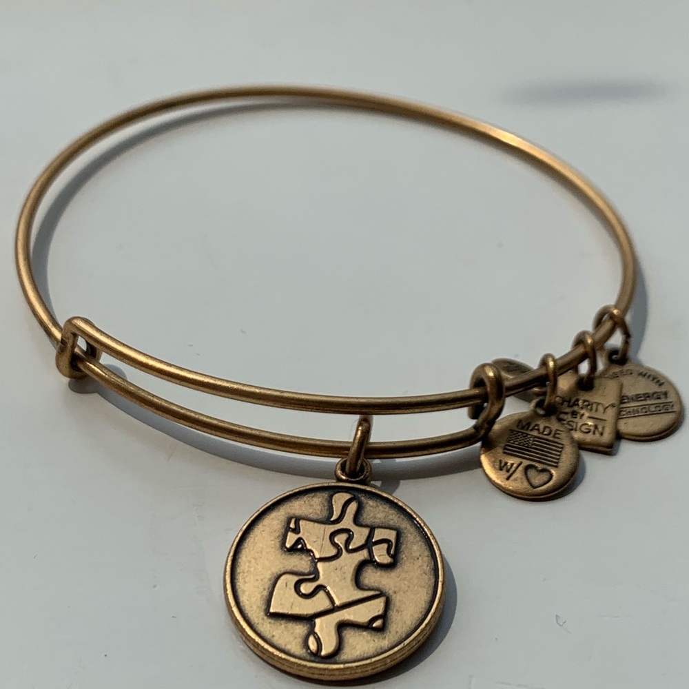 Puzzle piece gold Alex and Ani bracelet